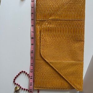 Elegant Yellow Snakeskin Clutch
